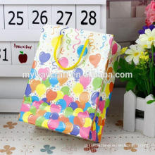 Colorful cheap shopping kraft paper bag with tissue handle